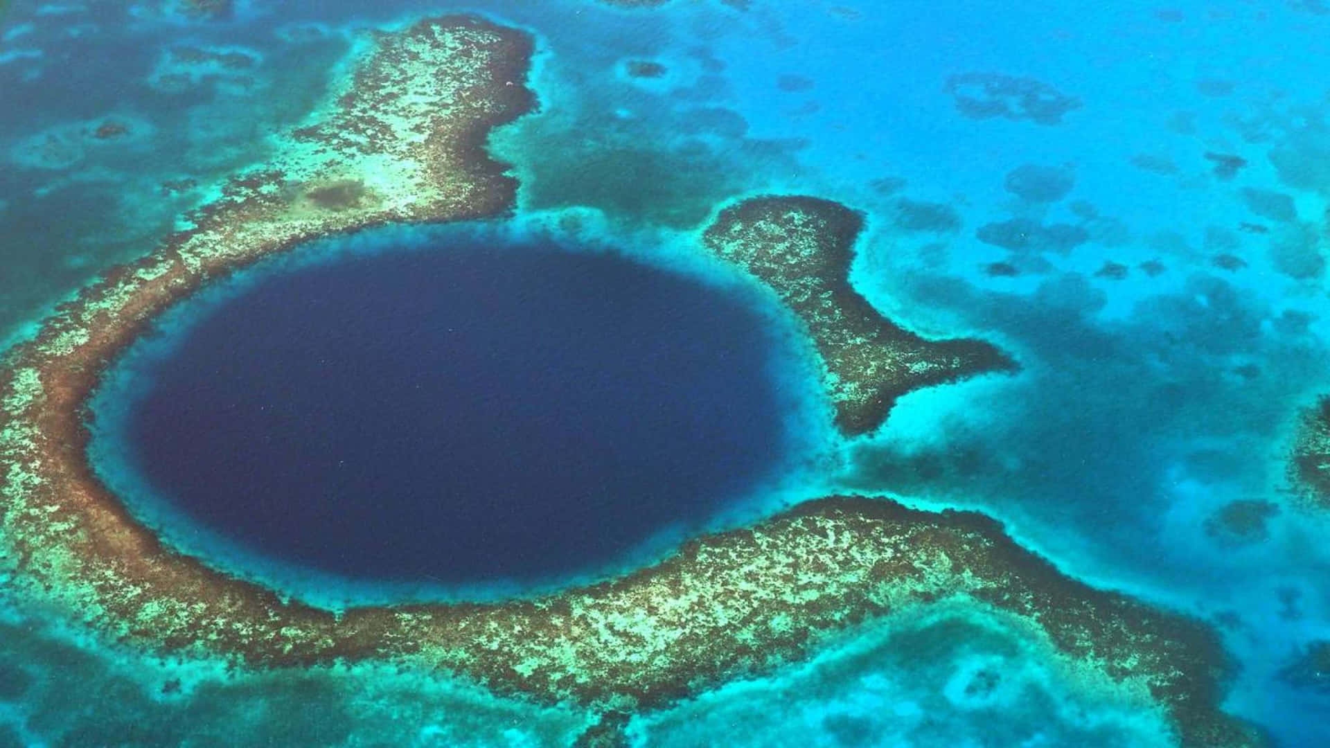 Glittering View Of Great Blue Hole Wallpaper