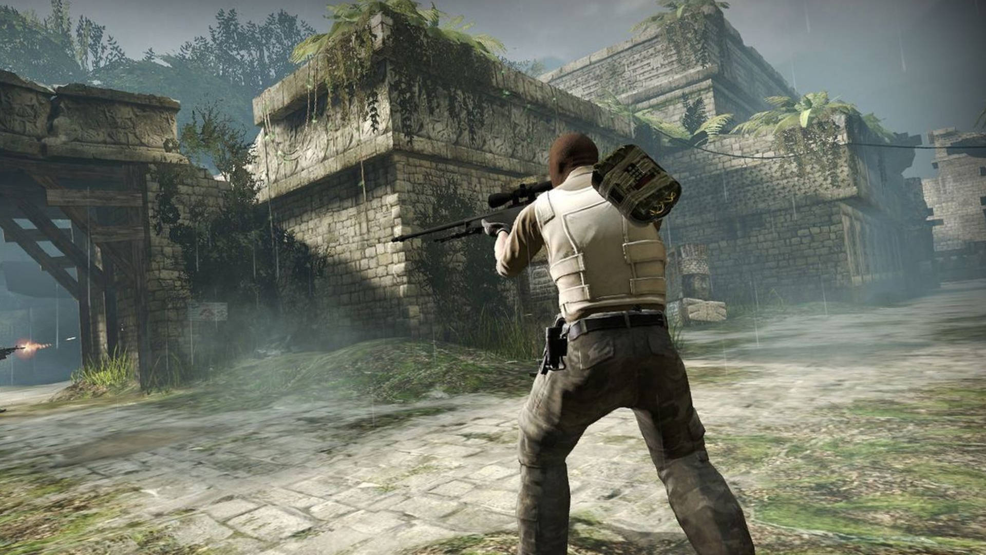 A Man Is Shooting A Gun In A Video Game Wallpaper