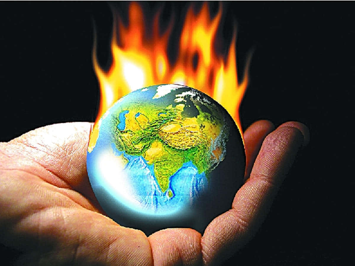 A Hand Holding A Burning Earth