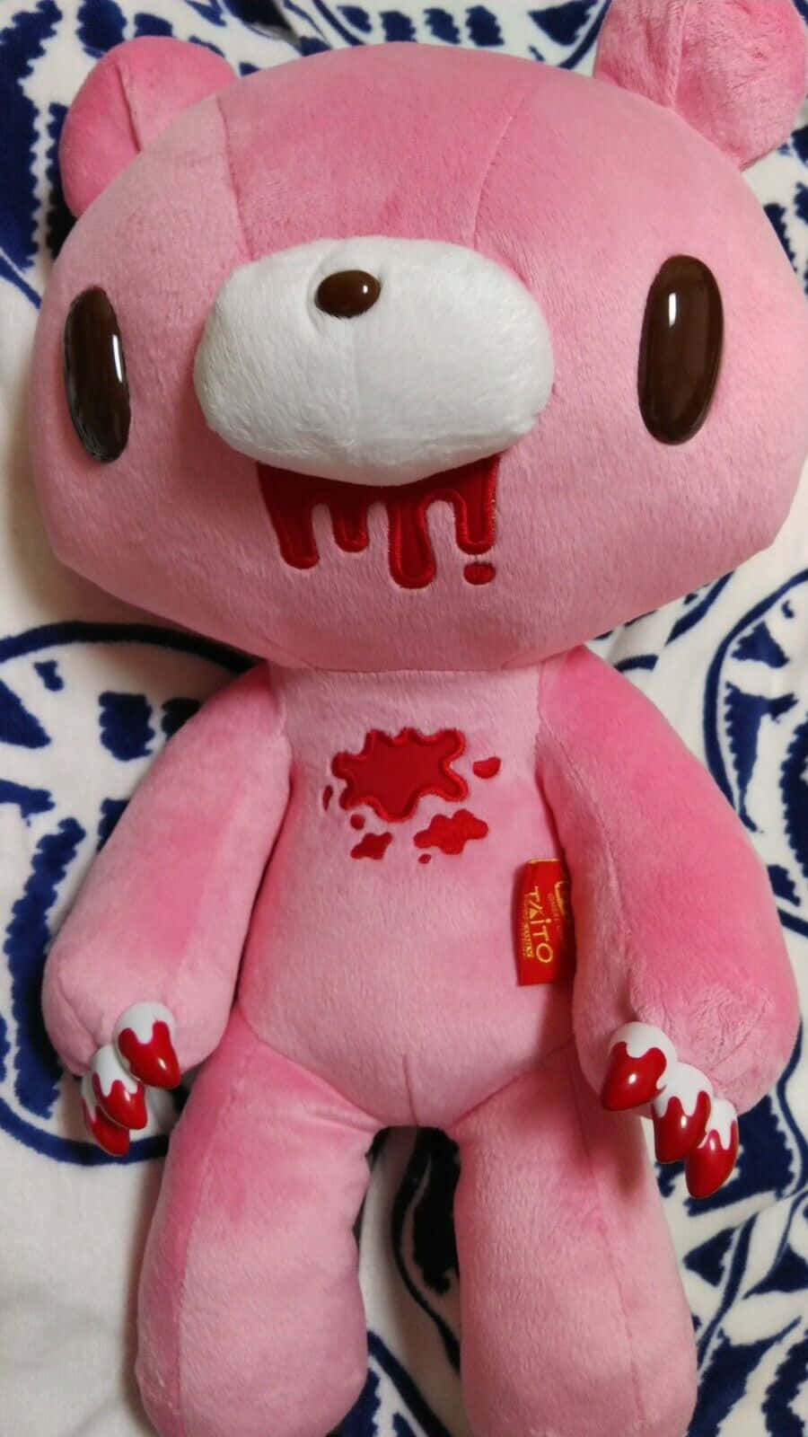 A Pink Stuffed Animal With Blood On It Wallpaper