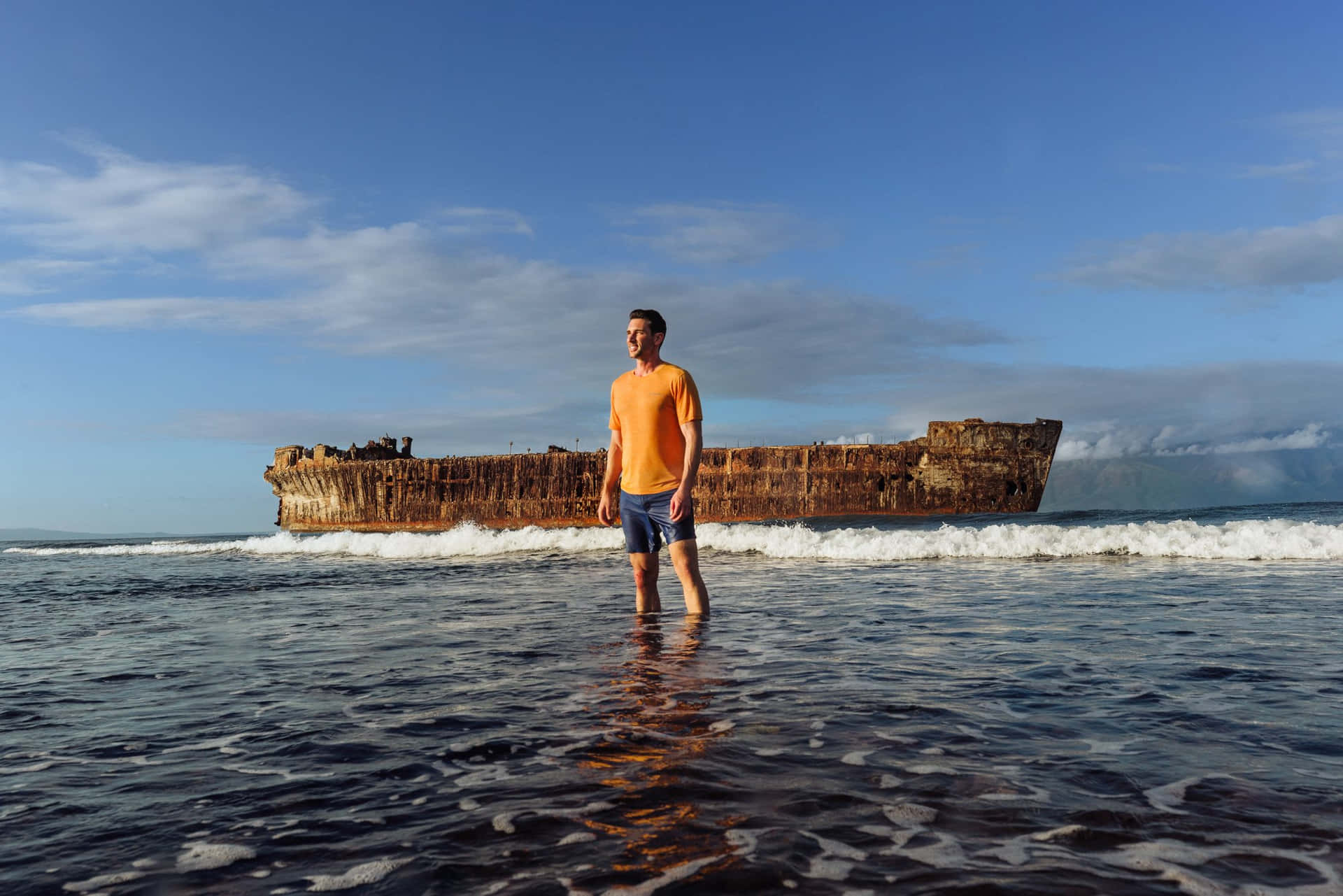 Gloomy Shipwreck On Rusty Shore Wallpaper