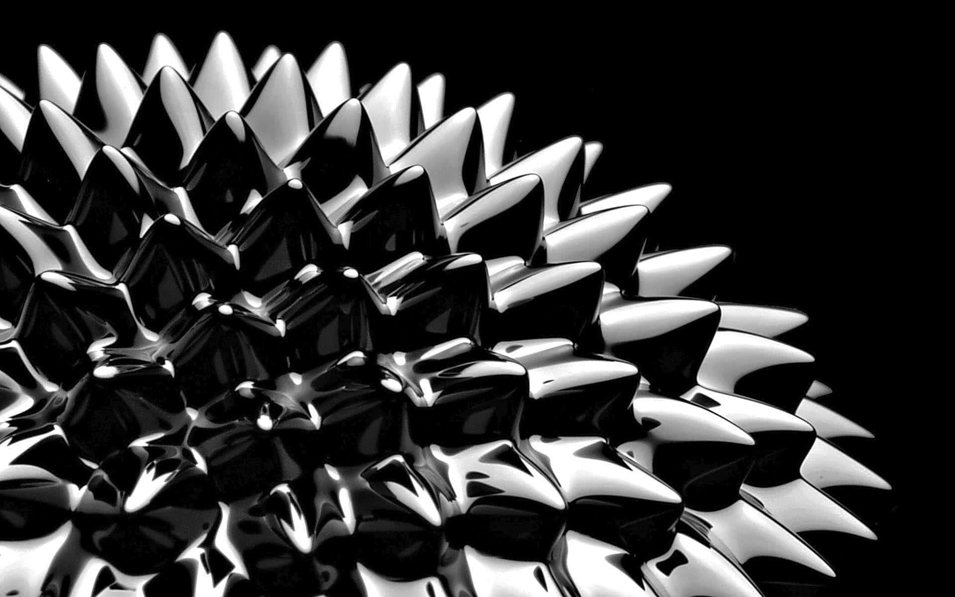 A Black And White Image Of A Spiked Ball Wallpaper