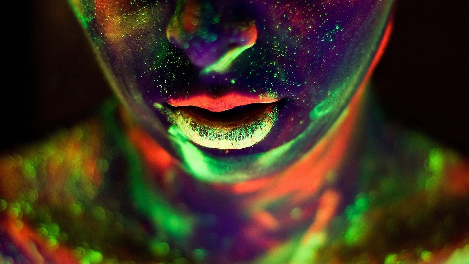 A Woman With Glowing Paint On Her Face