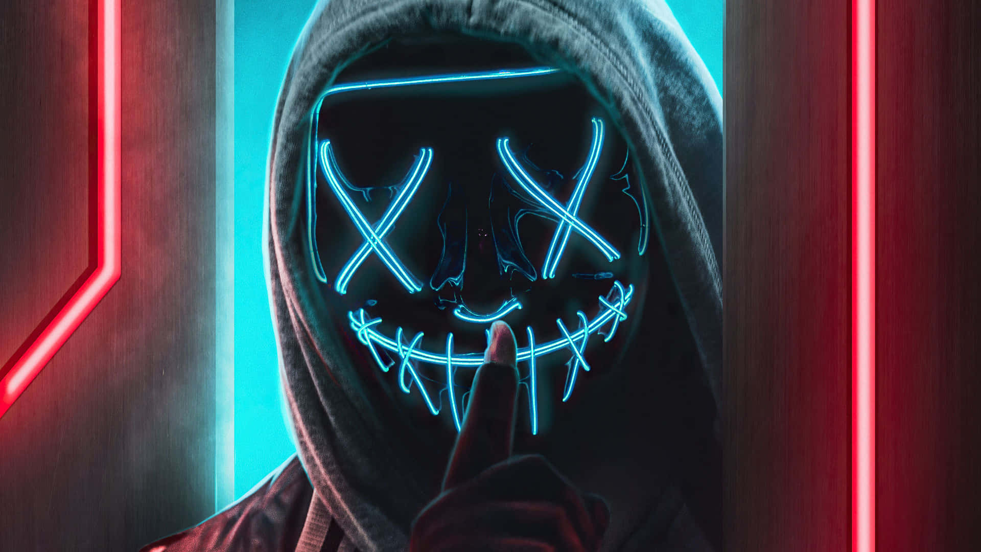 A Man In A Hoodie With Neon Lights On His Face