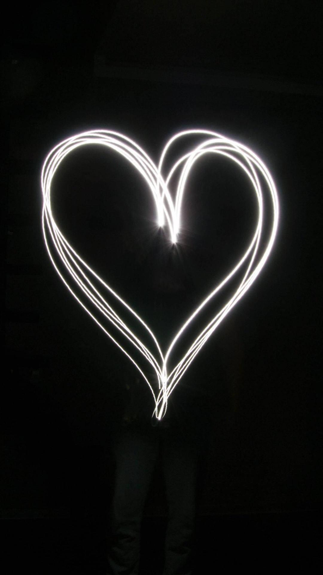 Download Glowing Black Heart On Black Wallpaper 