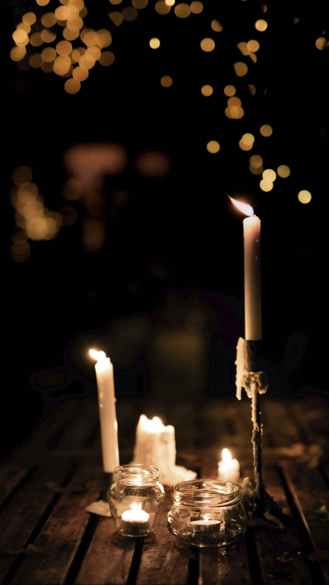 Glowing Candles In The Dark Wallpaper