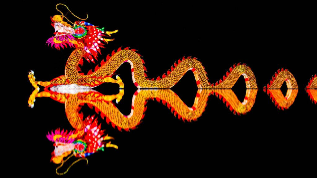 Glowing Chinese Dragon With Mirrored Image Wallpaper