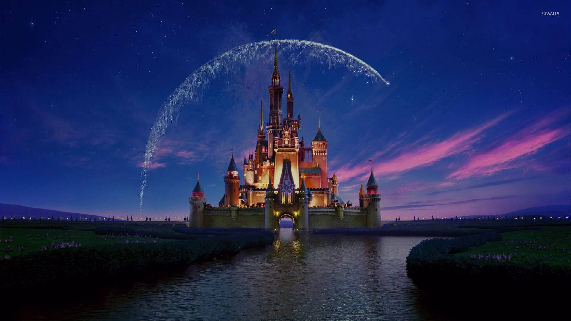 Glowing Disneyland Castle At Night Wallpaper