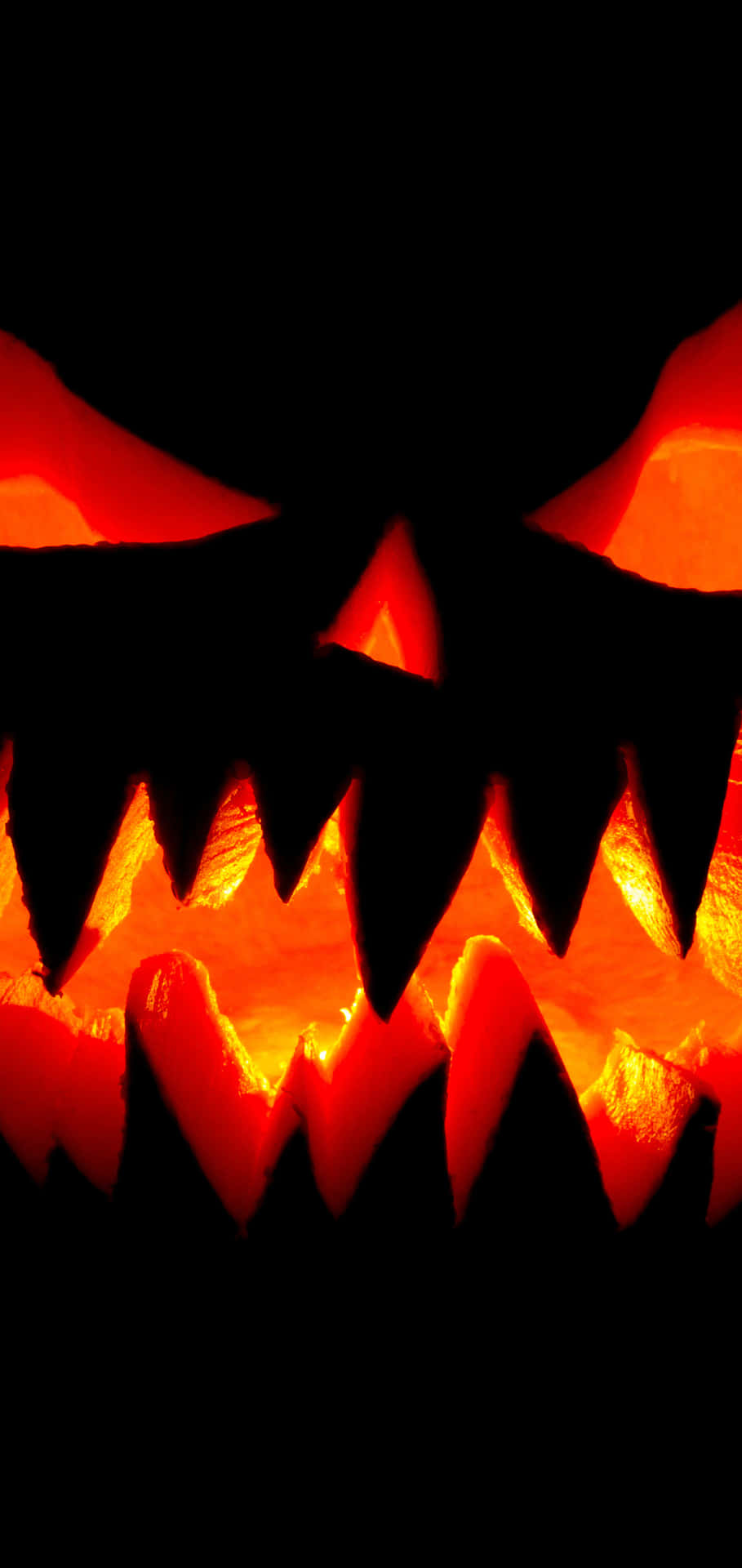 Glowing Halloween Pumpkin Face Wallpaper