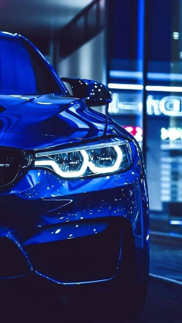 Glødende forlygte af blå BMW Wallpaper