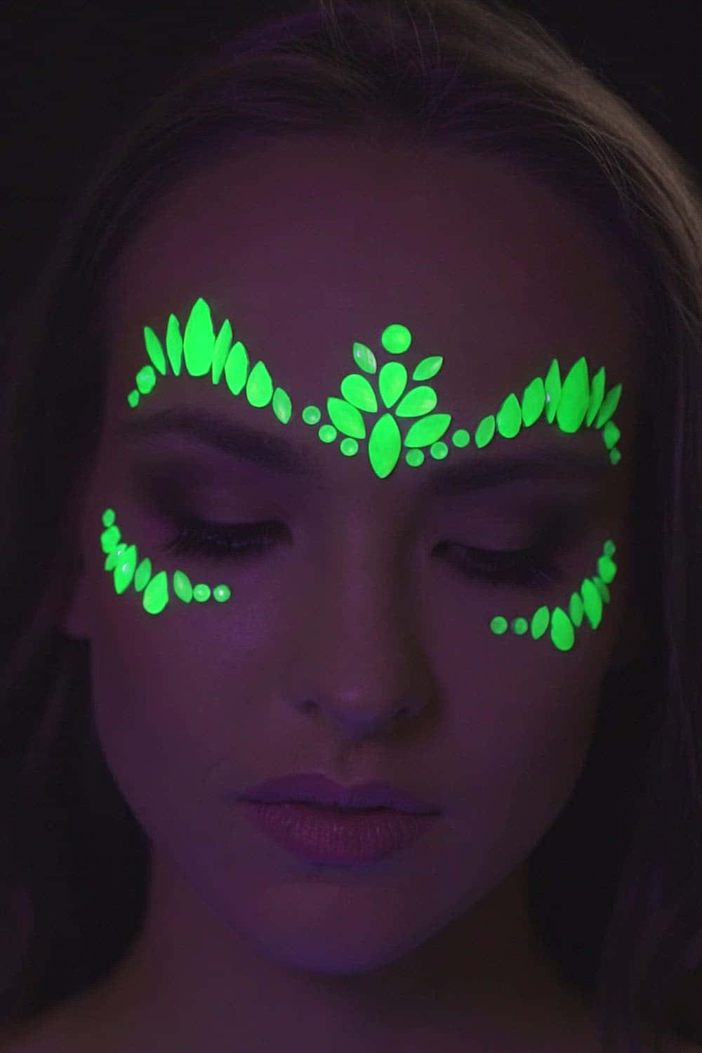 Glowing Neon Makeup Masterpiece Under Black Light Wallpaper