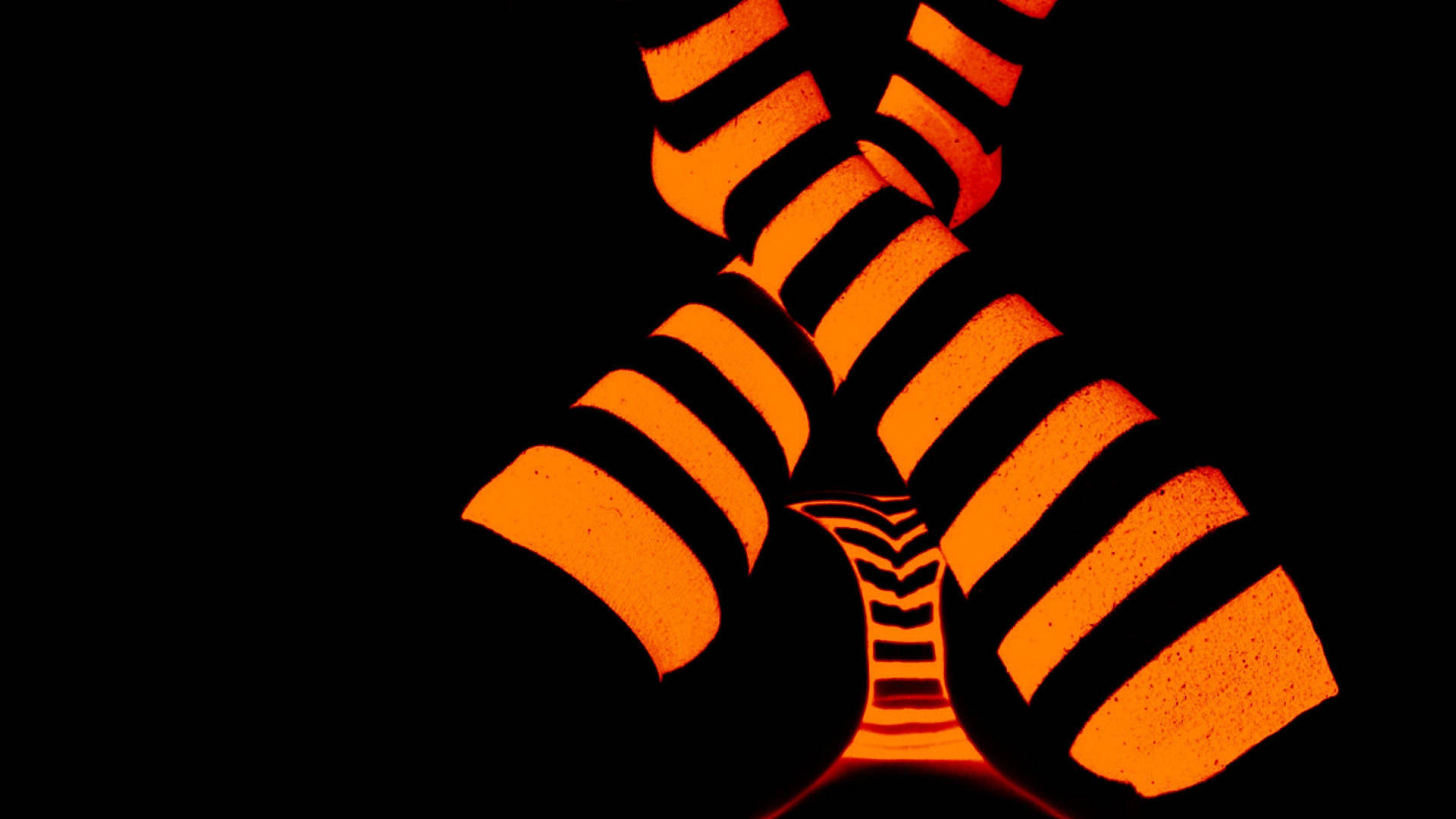 Glowing Neon Orange Socks Wallpaper