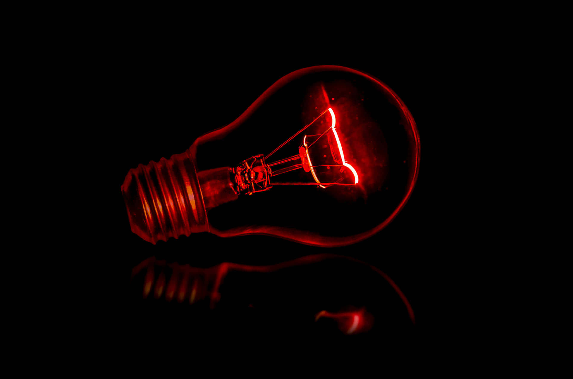 Glowing Red Electric Bulb Wallpaper