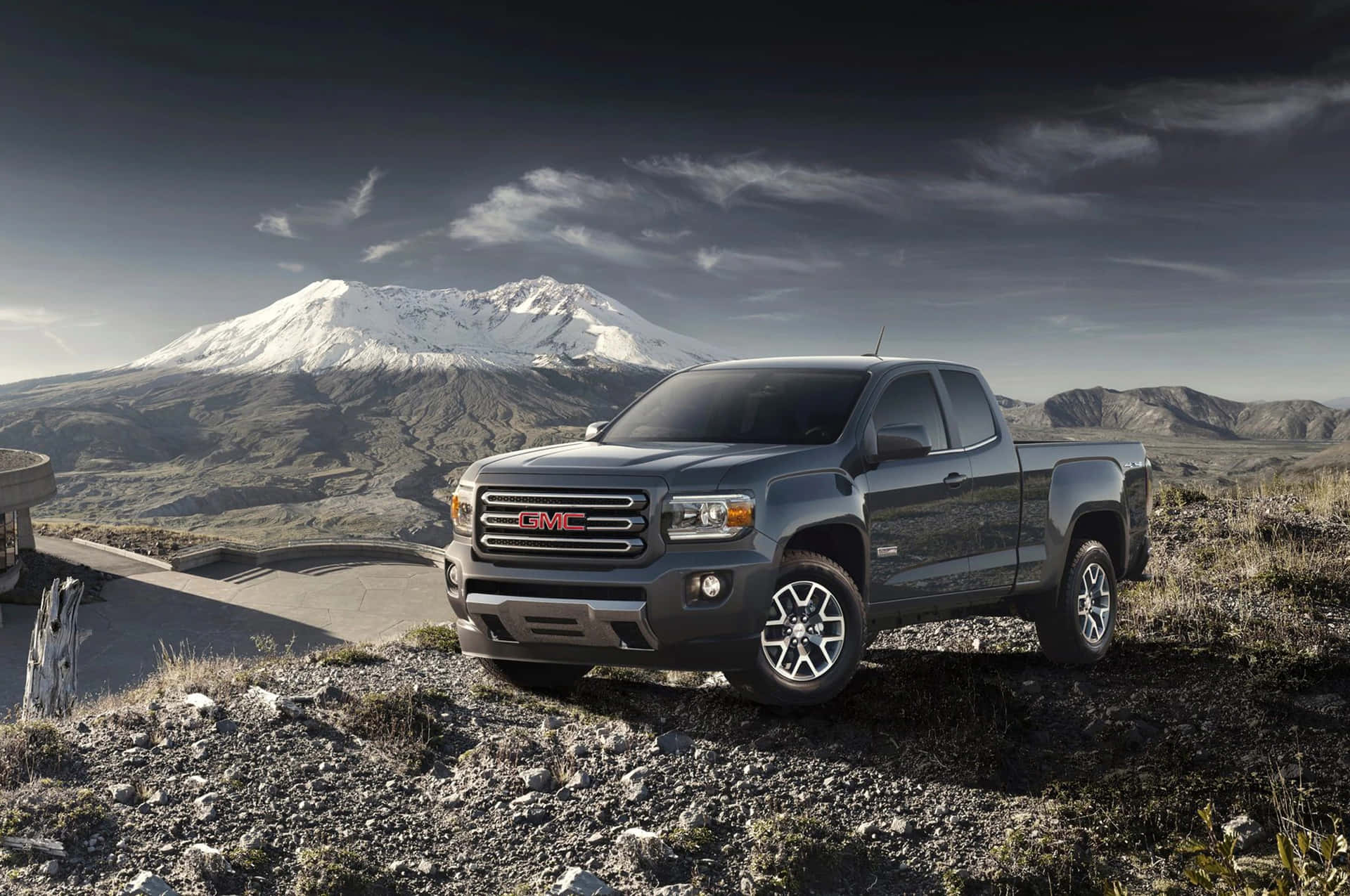 Sleek and Rugged GMC Canyon in Natural Scenery Wallpaper