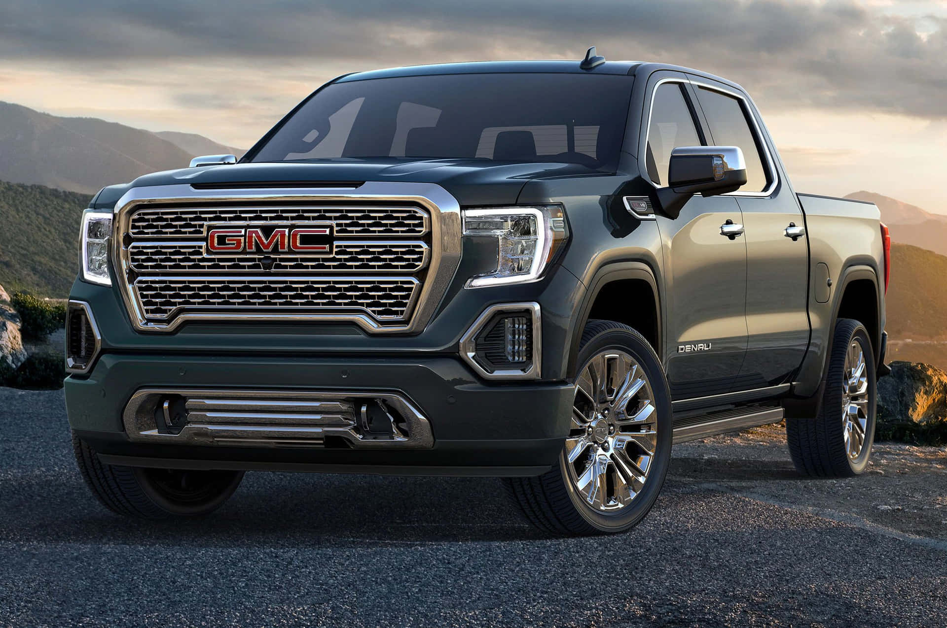 The 2020 Gmc Sierra Is Shown On A Mountain Road