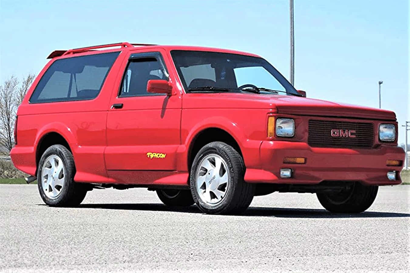 Immaculate GMC Typhoon showcasing its timeless design and powerful features Wallpaper