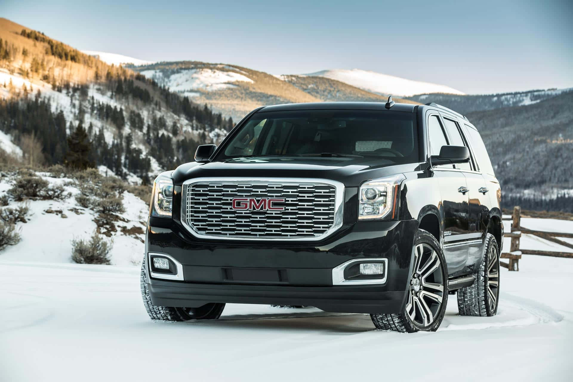 Sleek and Rugged GMC Yukon at Dusk Wallpaper