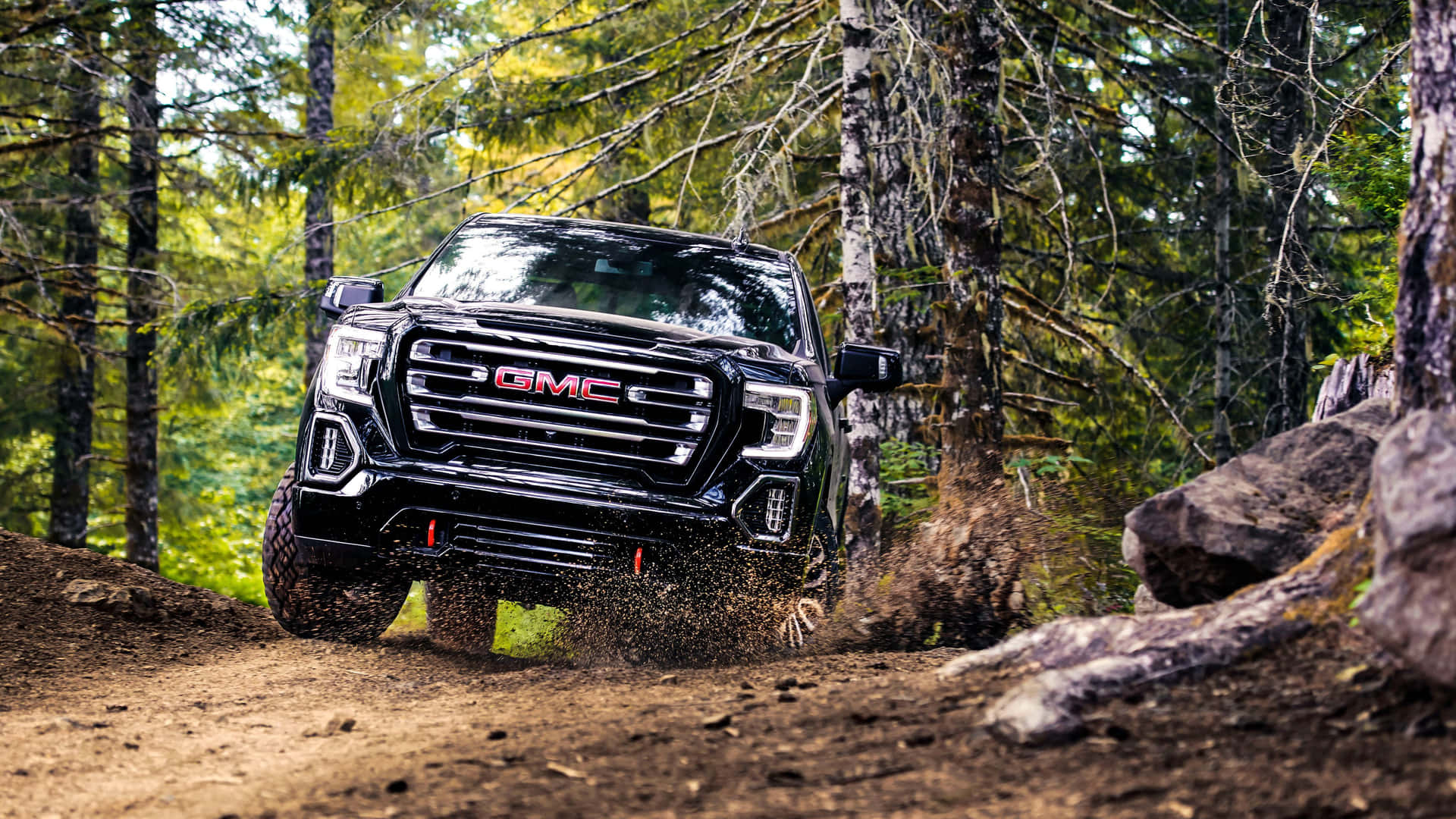 GMC Yukon in a Stunning Mountain Setting Wallpaper