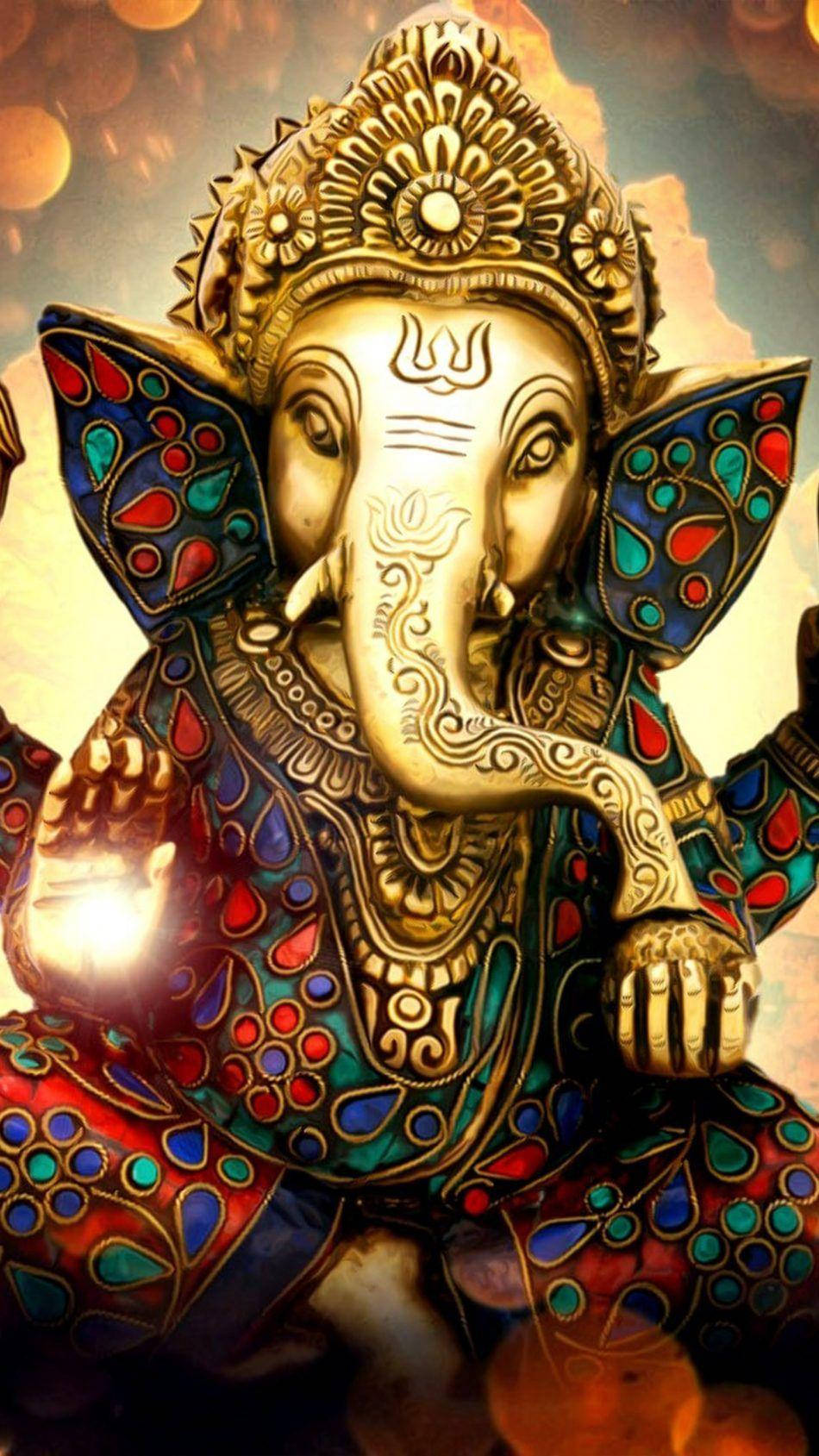 Download God Mobile Ganesha Gold Figure Wallpaper | Wallpapers.com