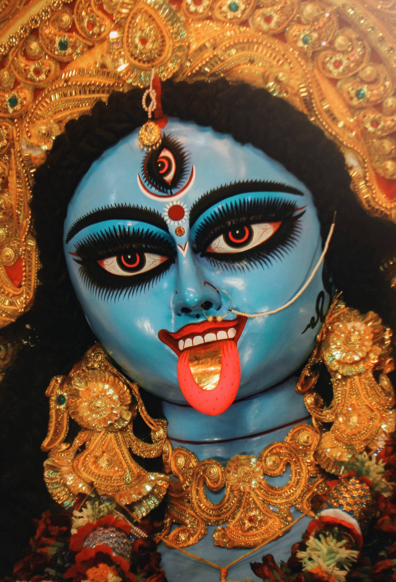 Goddess Kali Tongue Sticking Out Background
