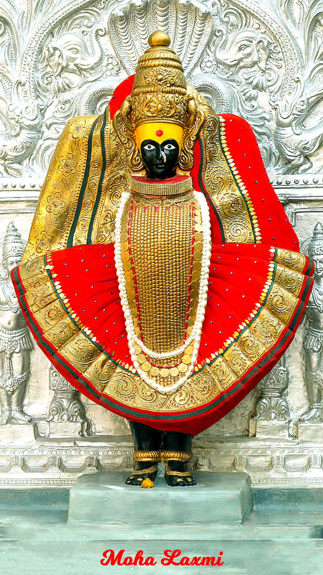 Goddess Lakshmi Statue In Red Clothes Hd