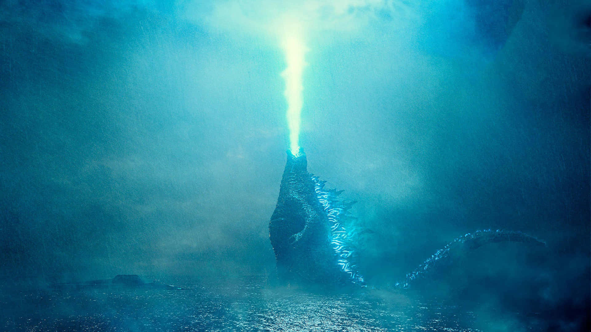 Godzilla Unleashing its Mighty Atomic Breath Wallpaper