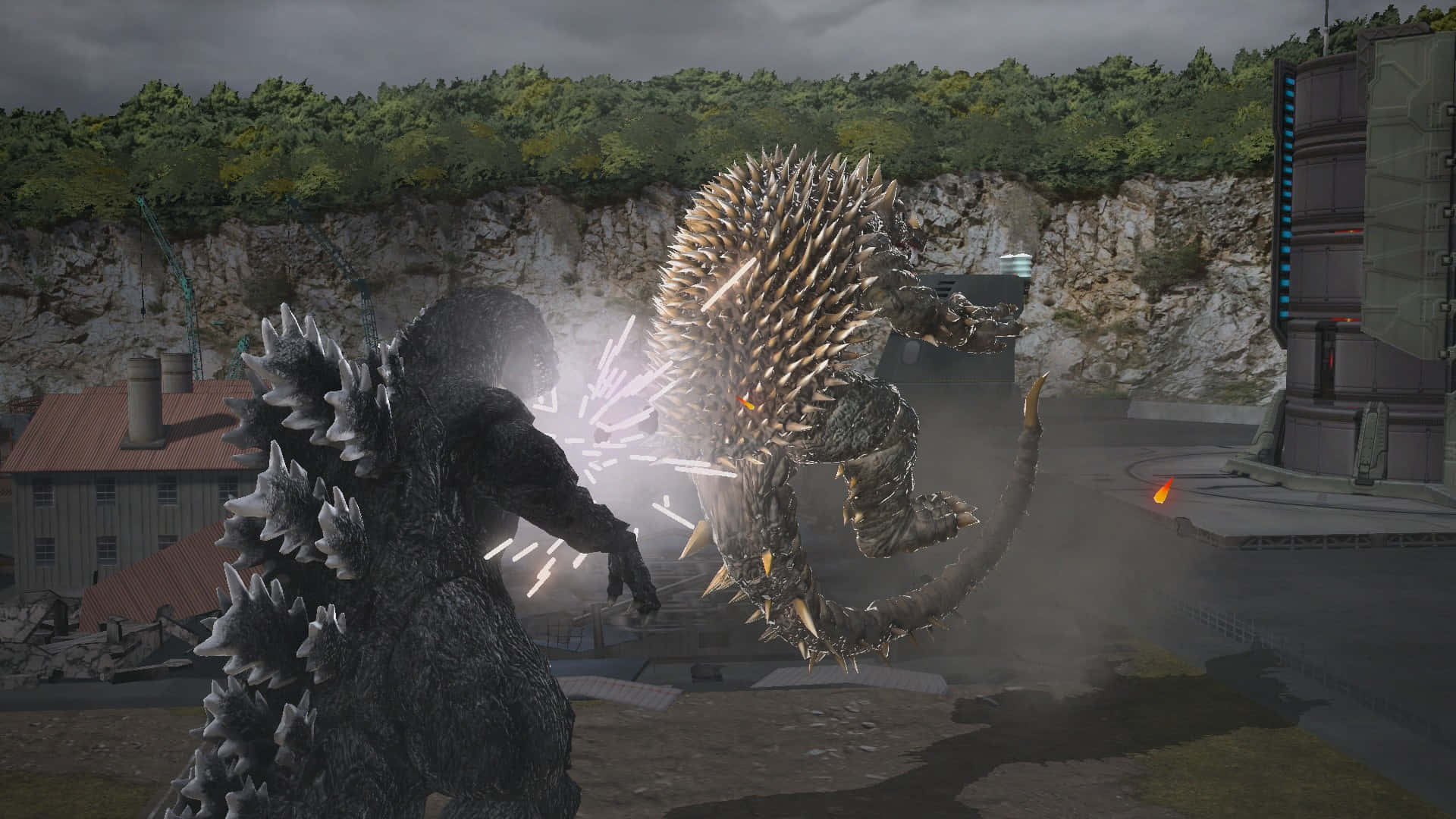 An epic battle unfolds between Godzilla and Anguirus Wallpaper