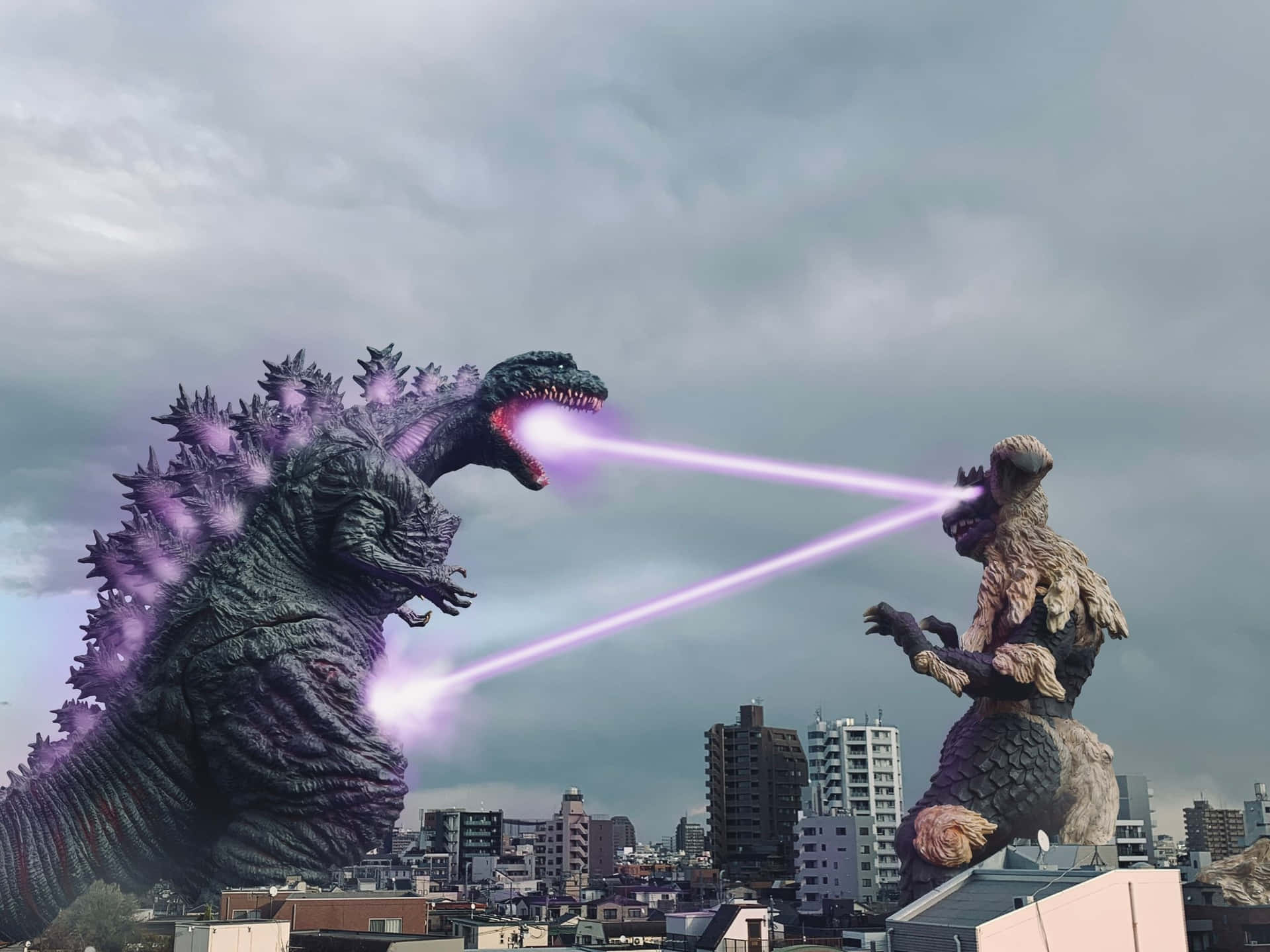 Godzillay King Caesar Se Enfrentan En Una Batalla Épica Fondo de pantalla