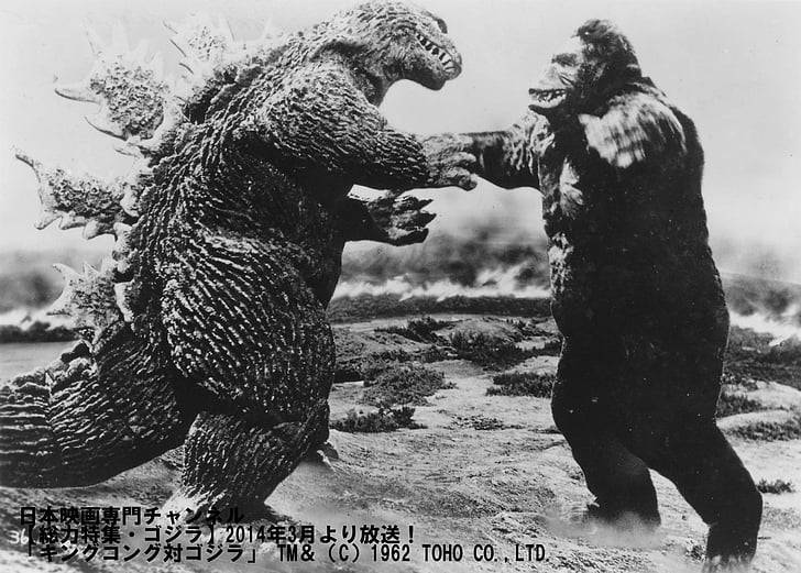 Two titans of titanic proportions face off - Godzilla and Kong battle it out for dominance Wallpaper