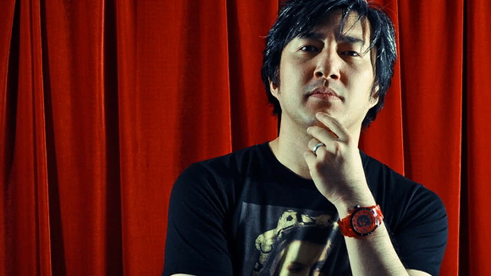 Goichi Suda - The Creator of Uniquely Innovative Video Games Wallpaper