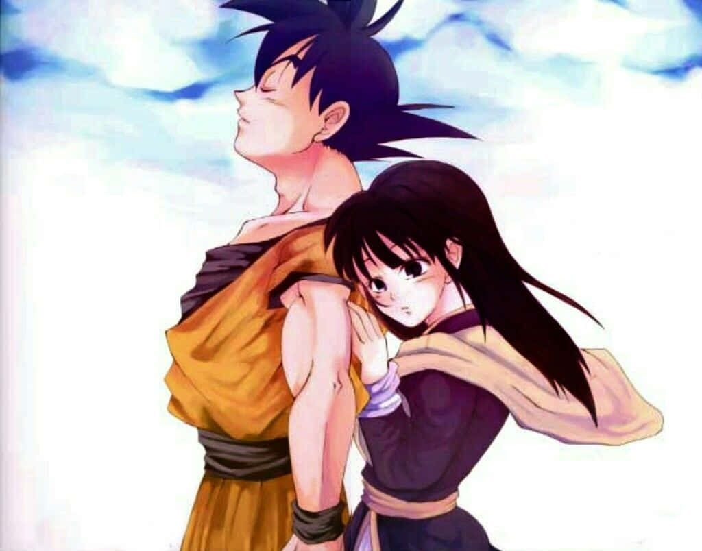 Goku og Chichi dele et hjerteligt kram Wallpaper