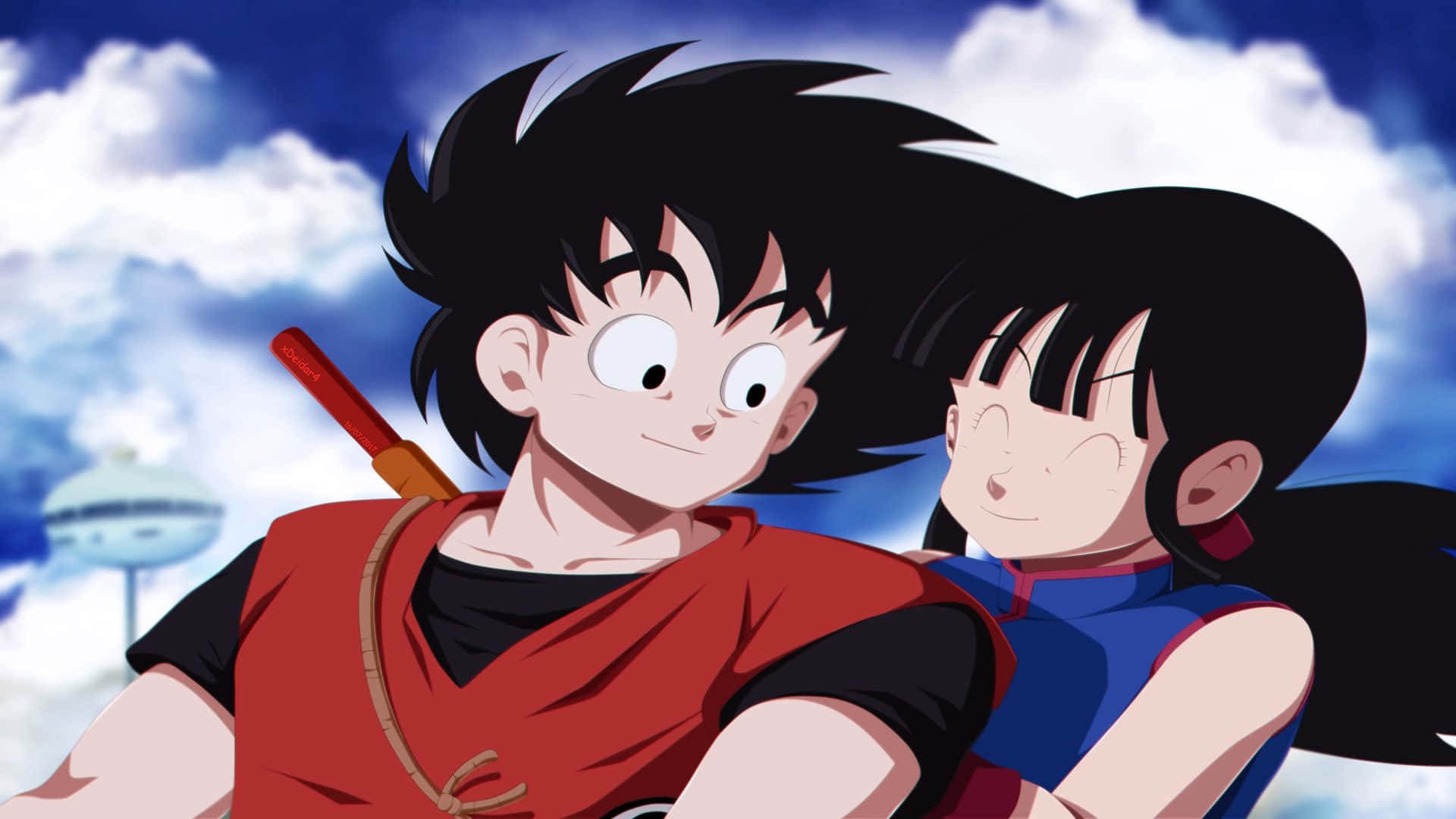 Goku og Chichi i et episk øjeblik af kærlighed, fred og samhørighed Wallpaper