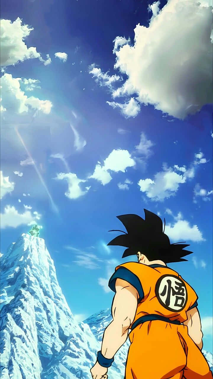 Goku_ Looking_ At_ Distant_ Mountain Wallpaper