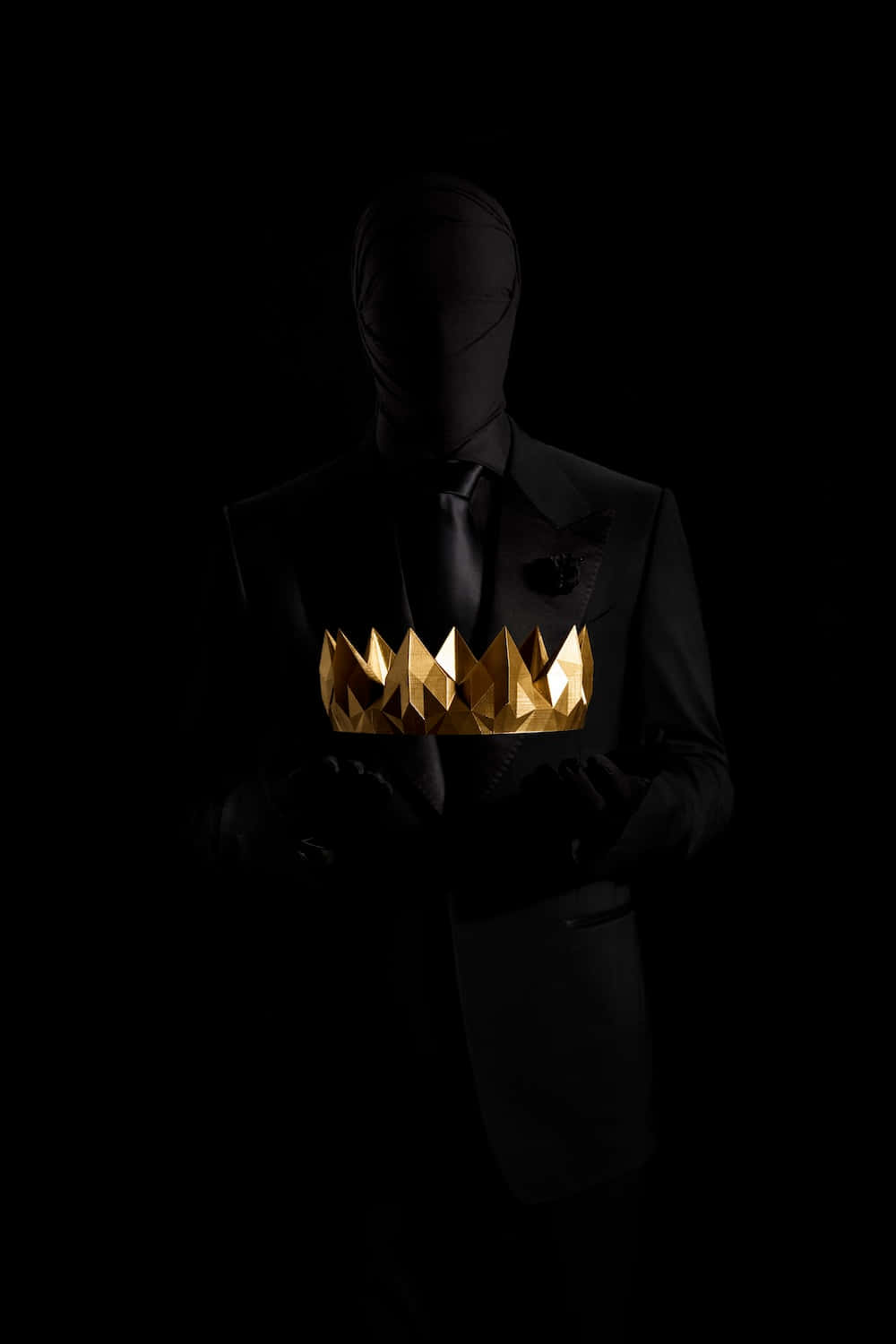 Person Holding Crown Gold And Black Background