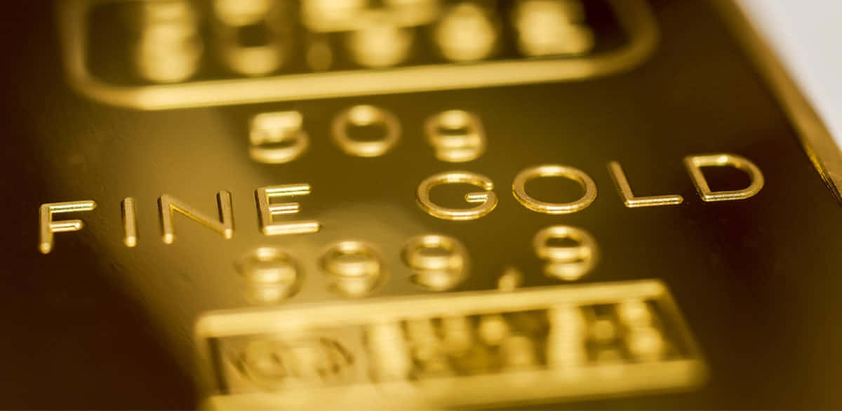 Golden bars of wealth on a black background