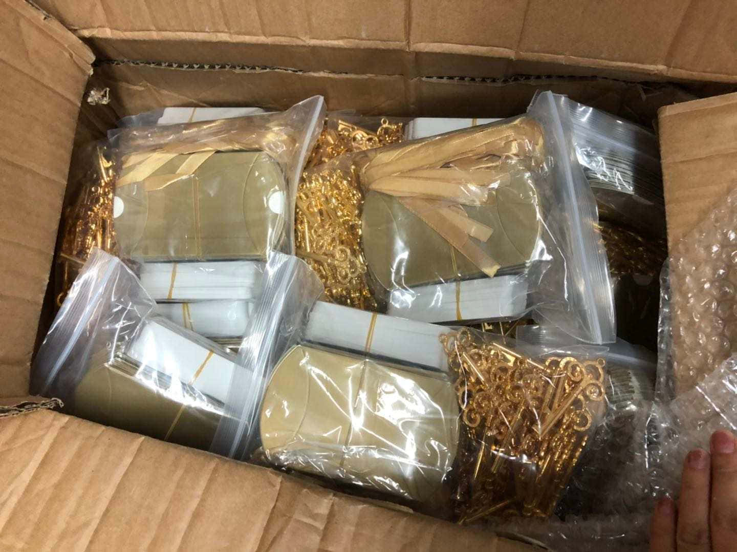 A Box Of Gold Wires In A Box