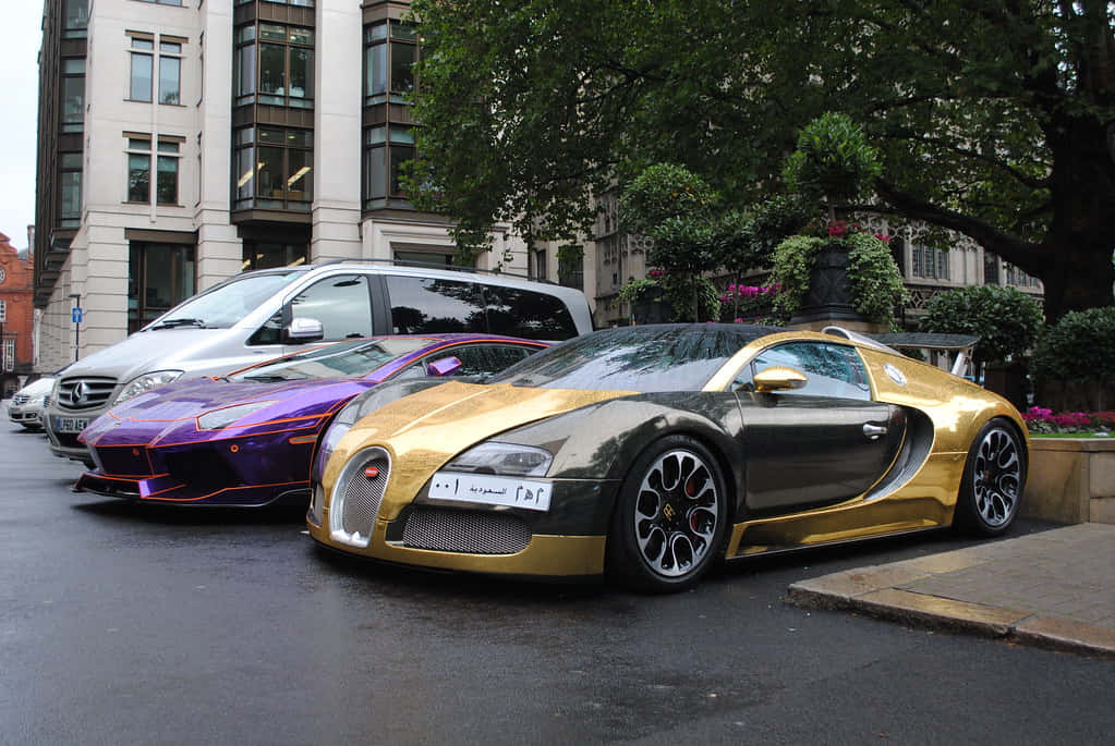 Detstrålande Guldiga Bugatti Veyron-bilen Wallpaper
