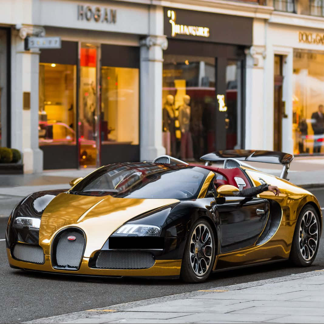 Gold Bugatti Veyron Car With Stores Wallpaper
