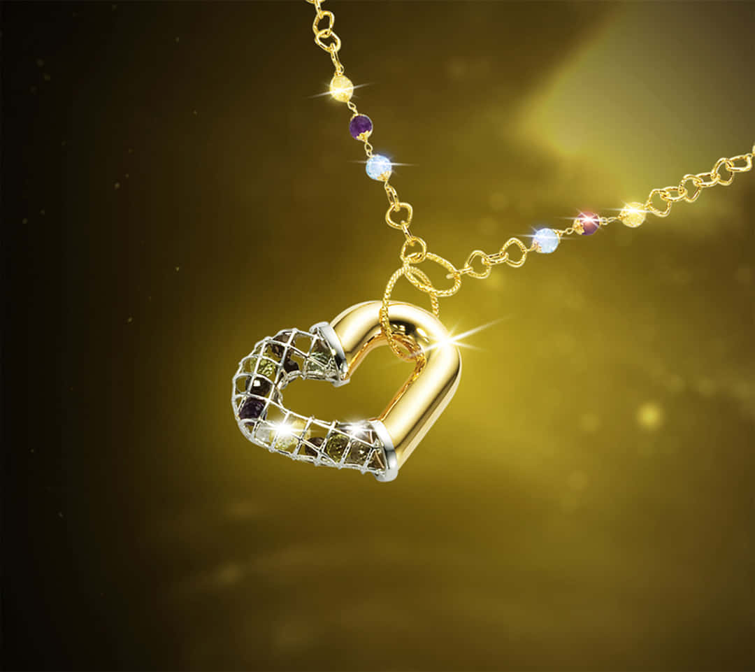 A gold chain glimmering in the light Wallpaper