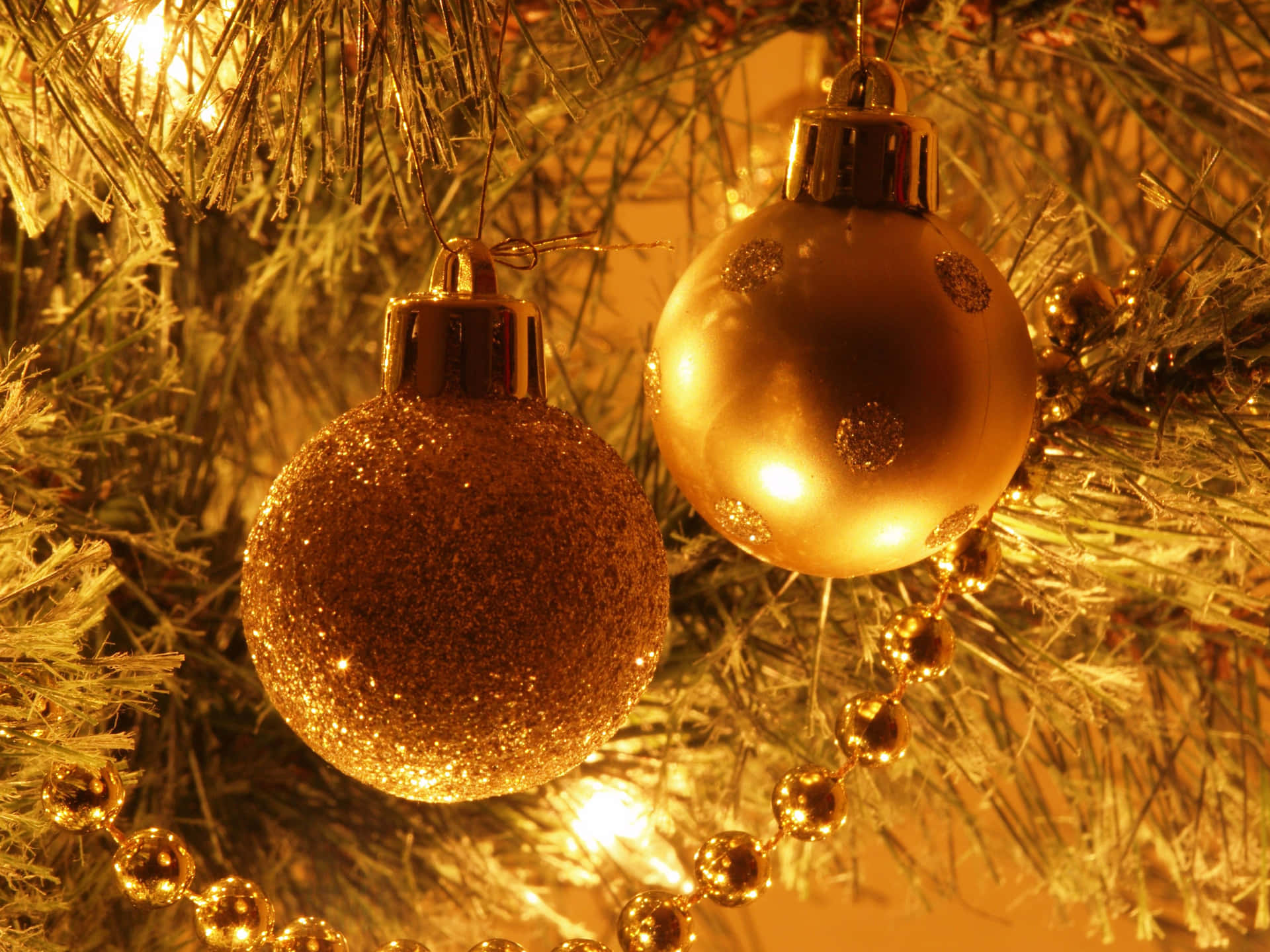 Illuminate your Christmas with golden festive décor. Wallpaper