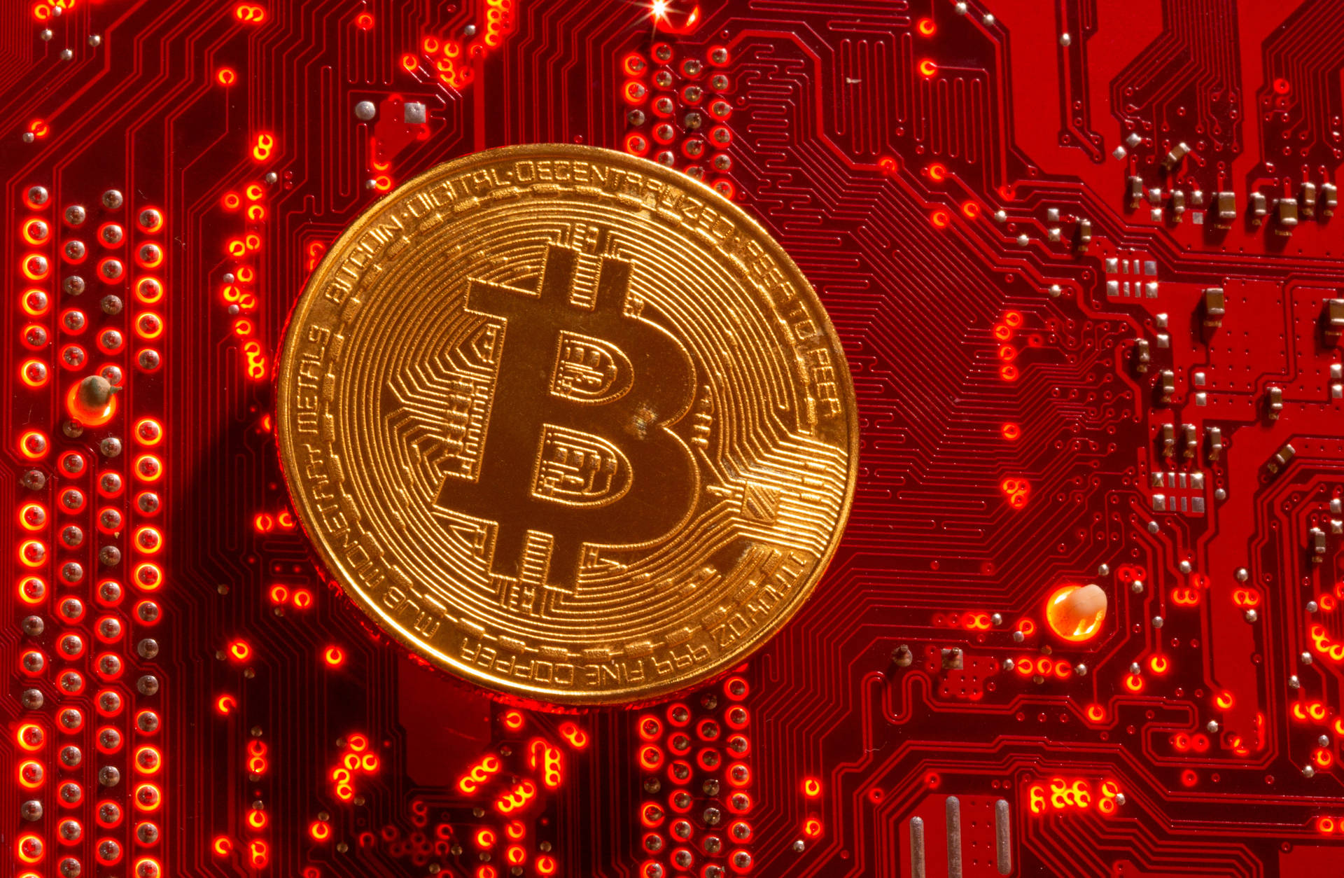 Gold Cryptocurrency Coin On Red