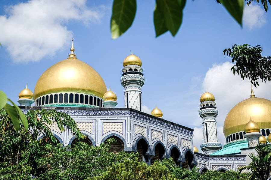 Majestic Gold Domes of the Brunei Mosque Wallpaper