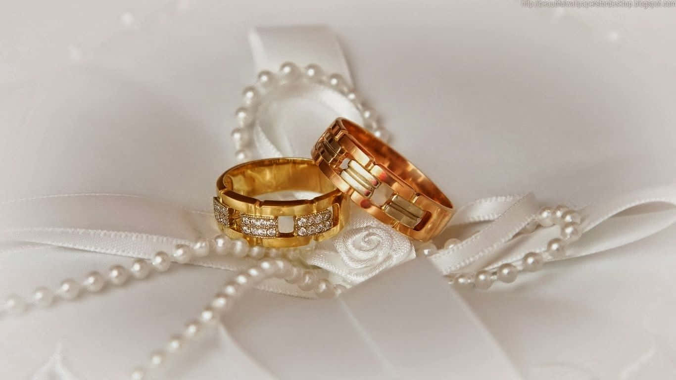 Gold Engagement Couple Rings Pearl Wallpaper