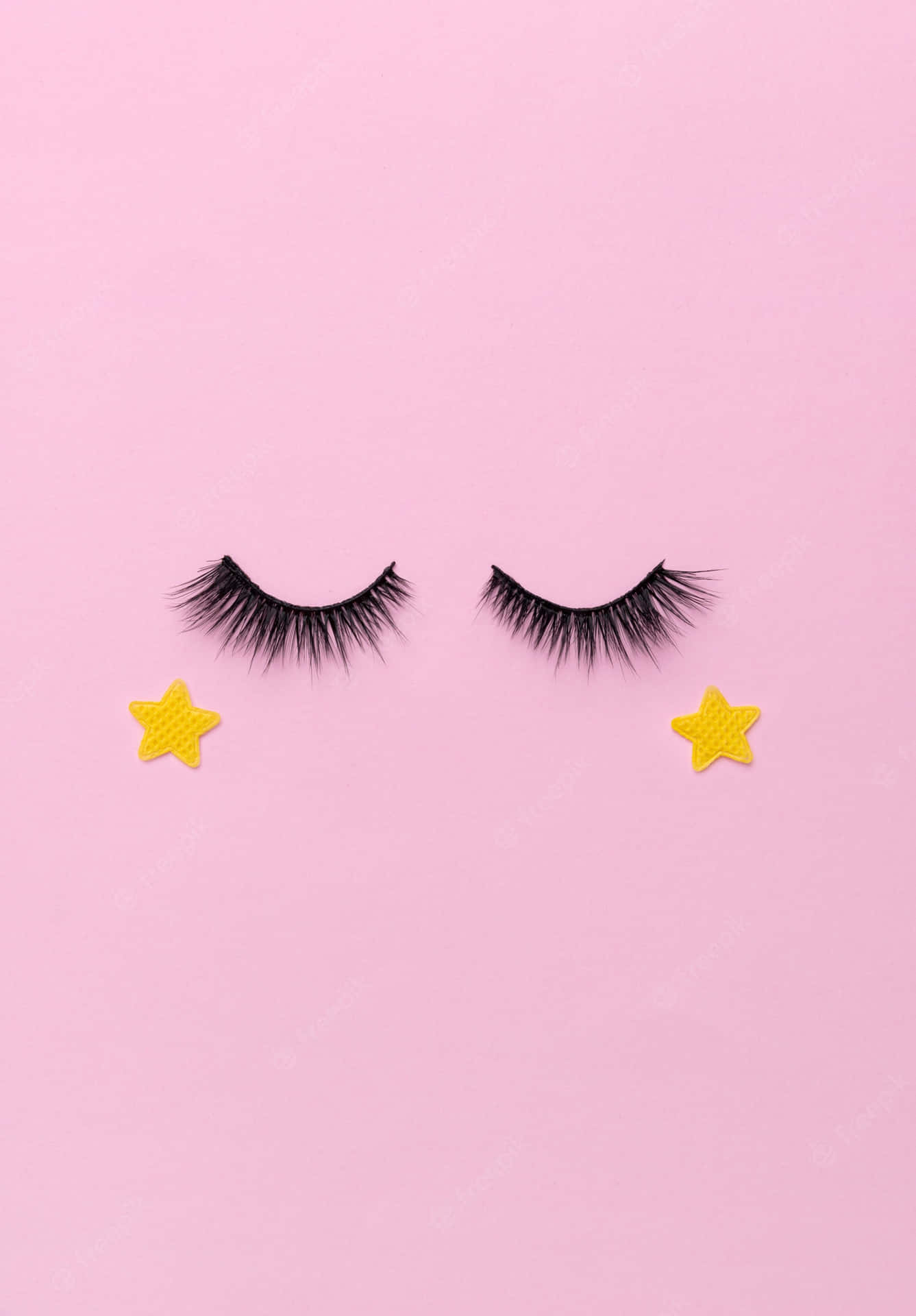 Einpaar Falsche Wimpern Mit Sternen Auf Einem Rosa Hintergrund. Wallpaper