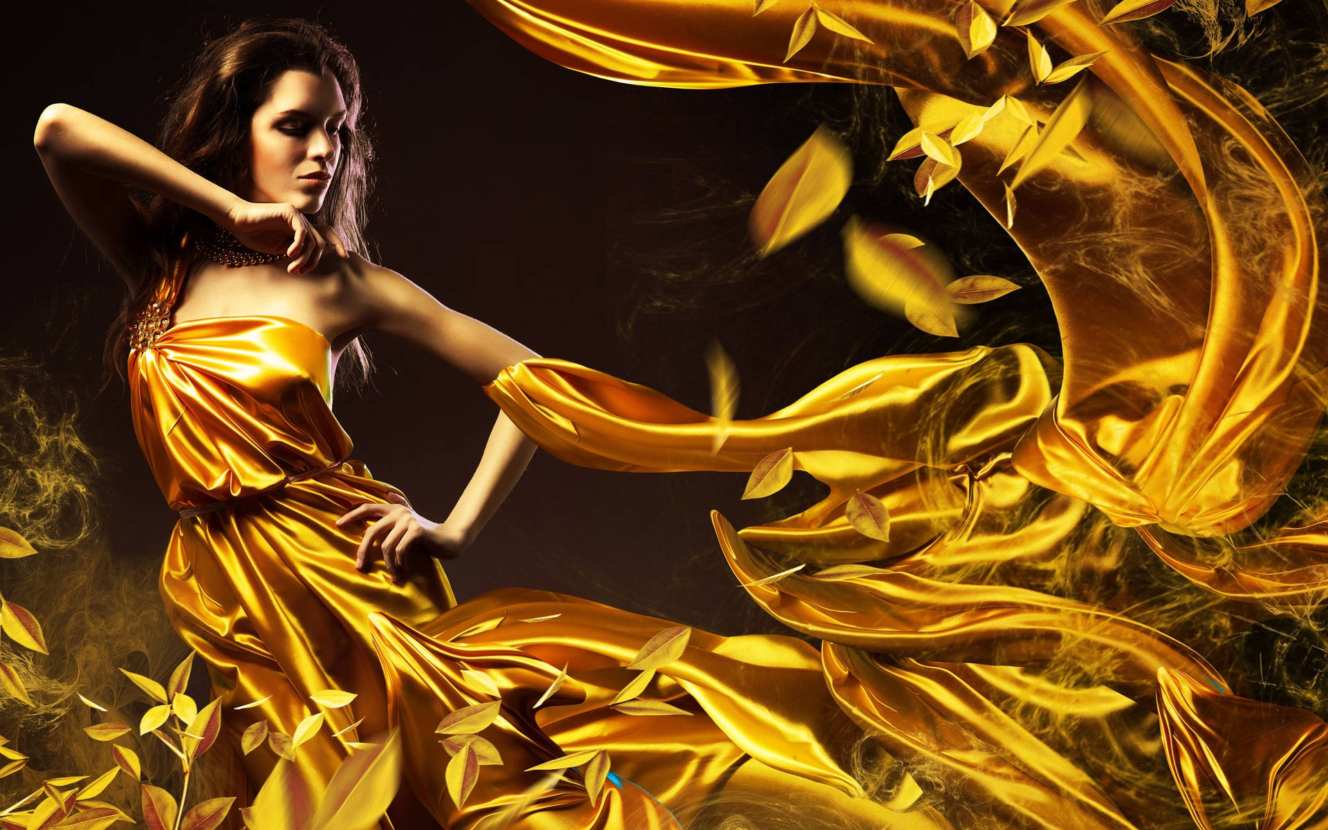 Fashion model in gold silky dress wallpaper.