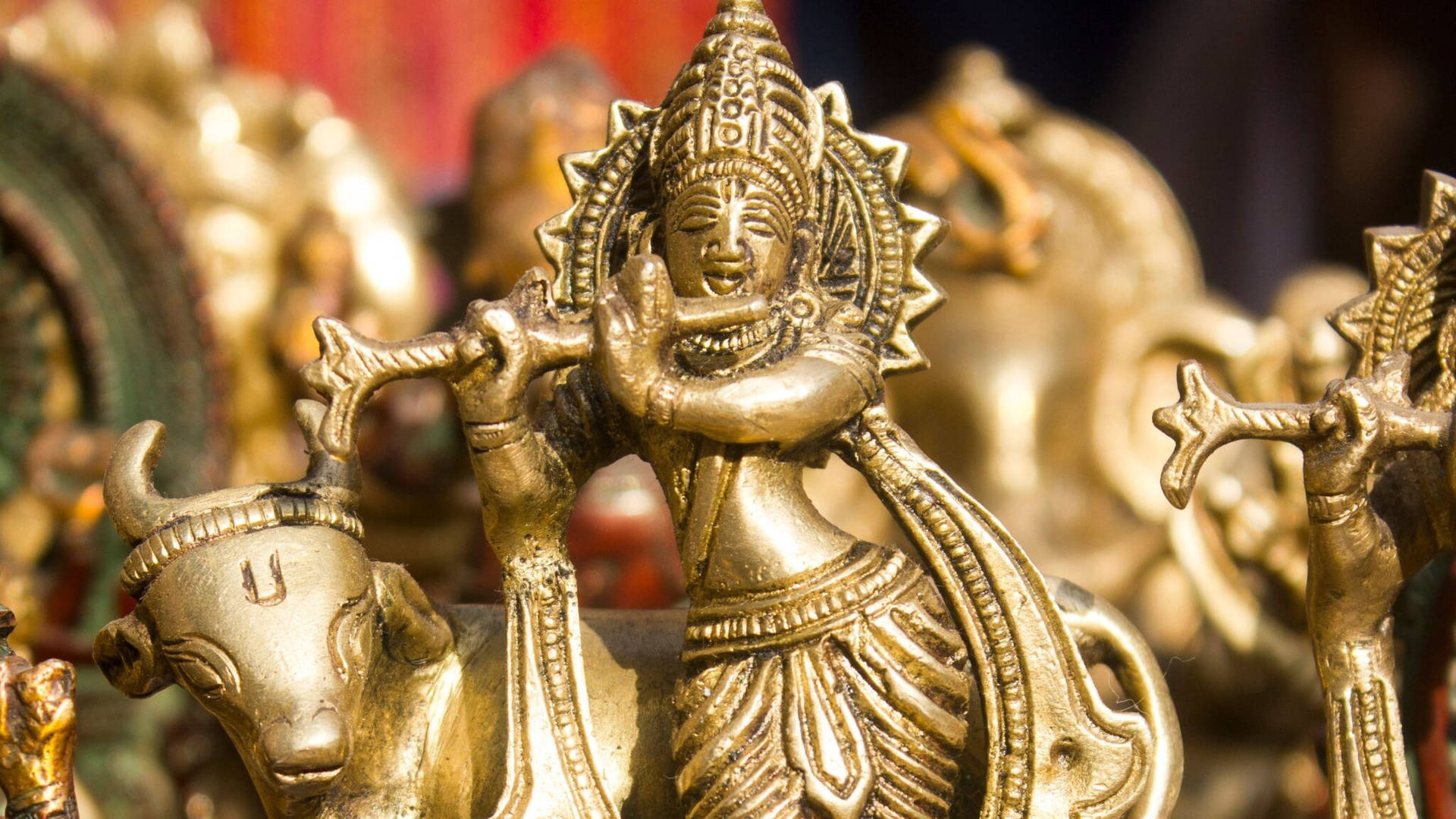Statuetta D'oro Di Krishna Desktop Sfondo