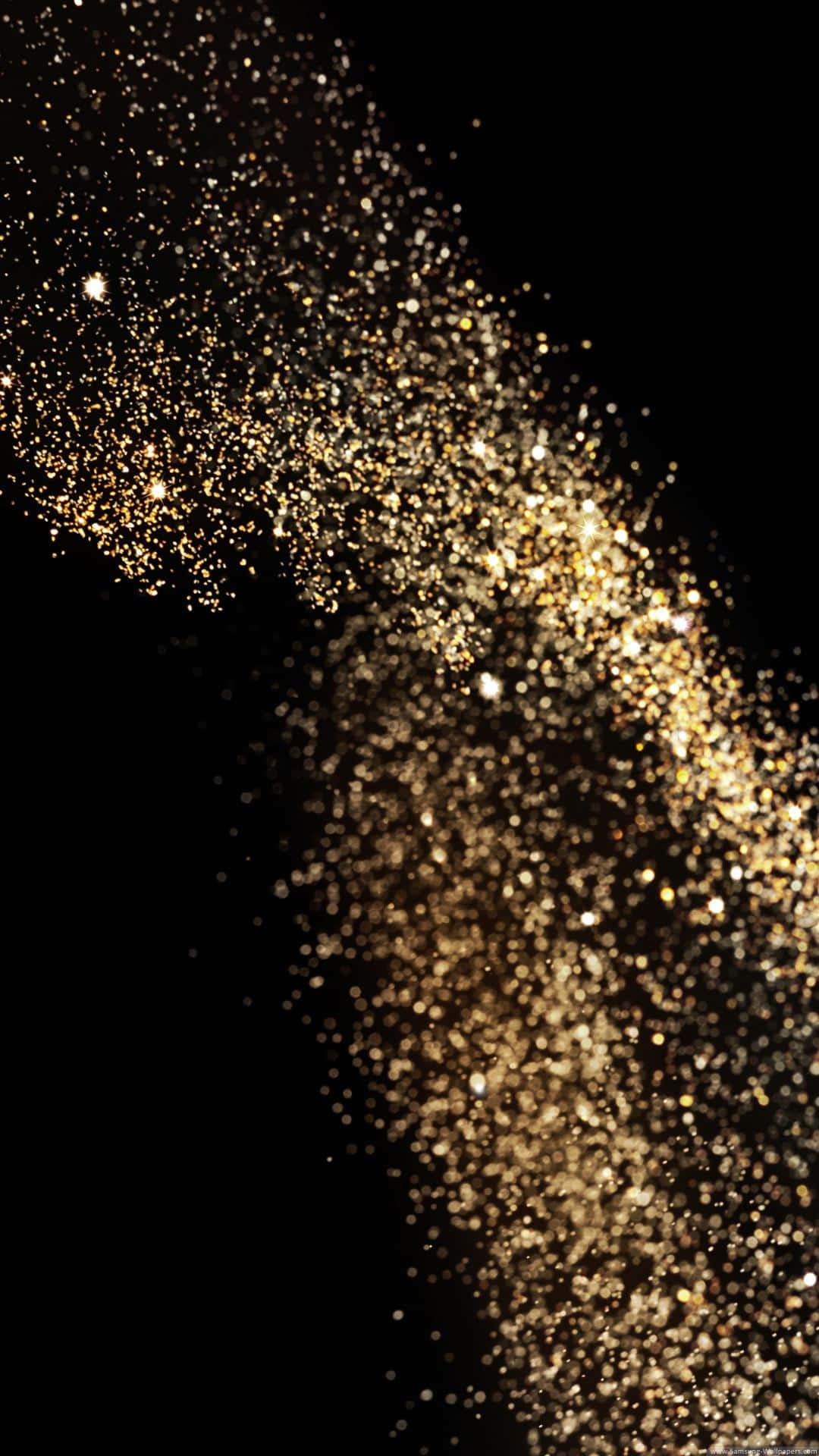 A Gold Dust Falling On A Black Background Wallpaper