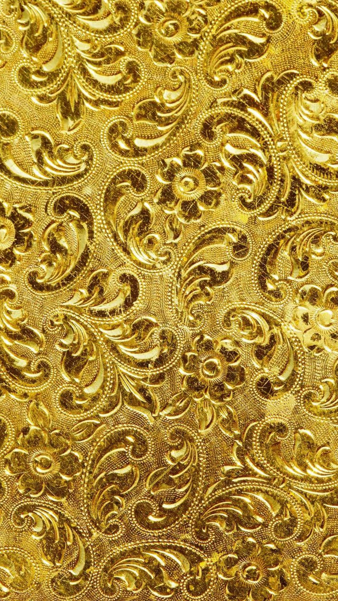 Goldenesiphone Mit Floral Verziertem Muster. Wallpaper
