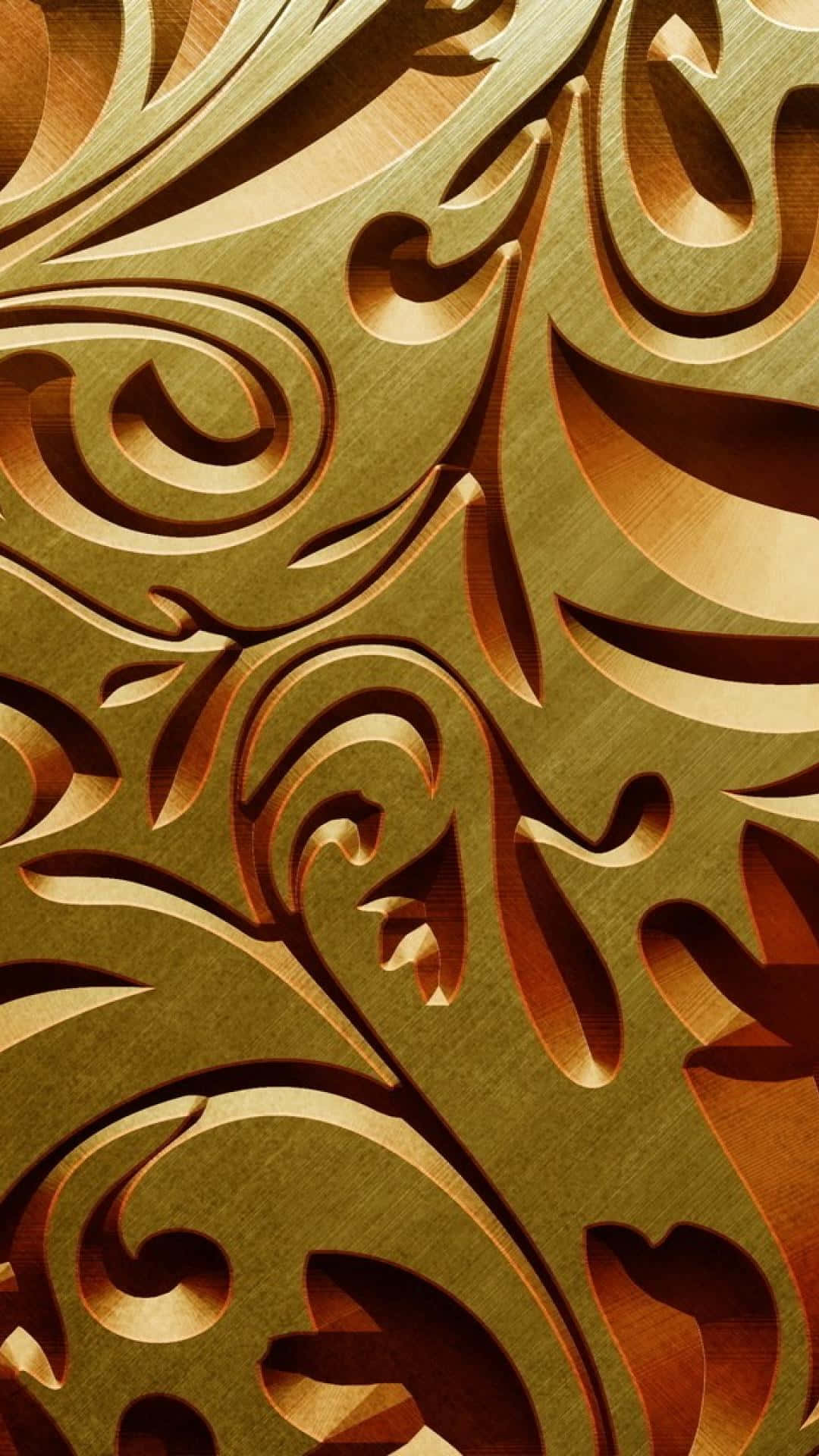 A Gold Carved Pattern On A Wall Wallpaper