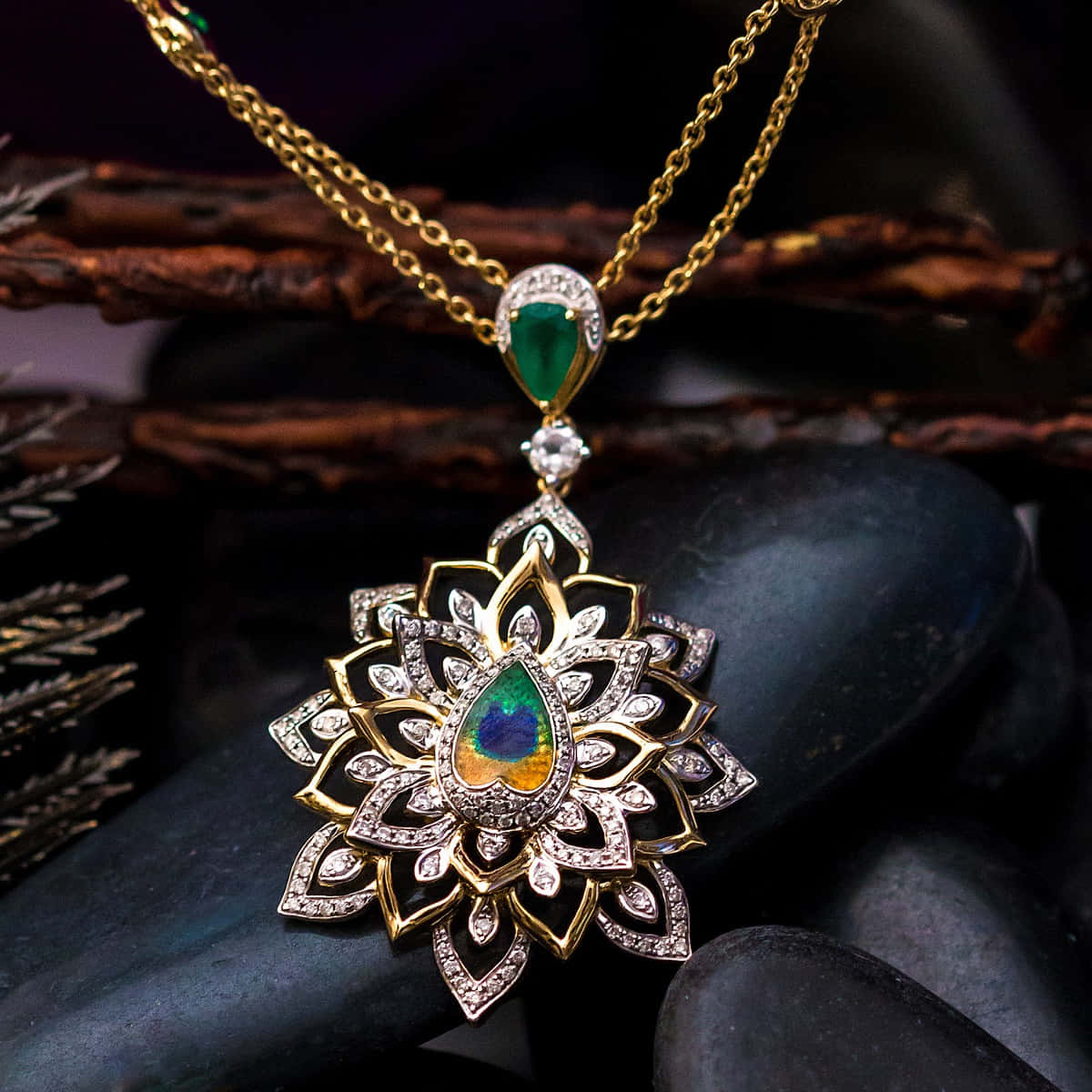 A Pendant With A Green Opal And Diamonds
